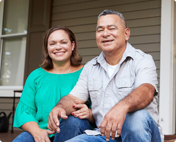 Happy couple on front porch
