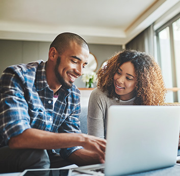 a family happily reading the costs of their repair