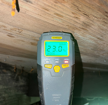 Using a measure to solve a moisture issue in a crawl space