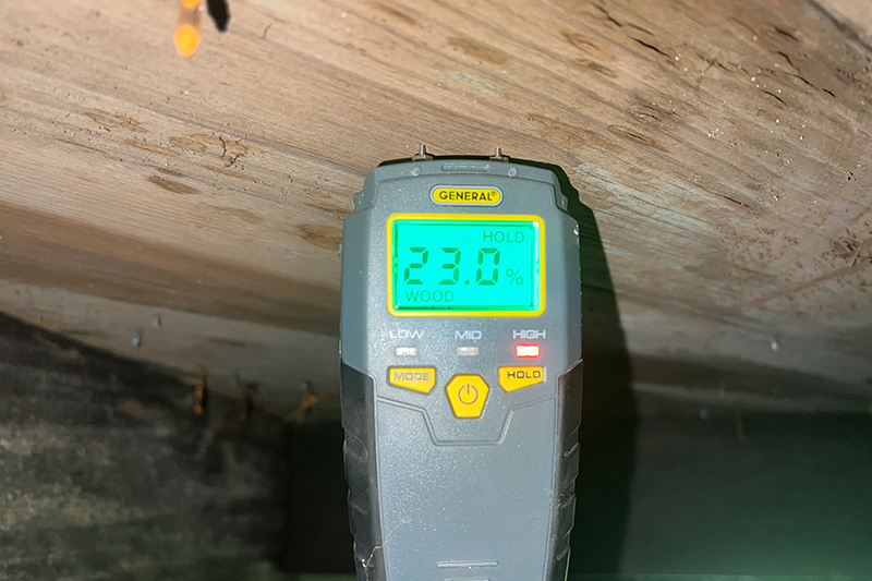 checking air quality in crawl space