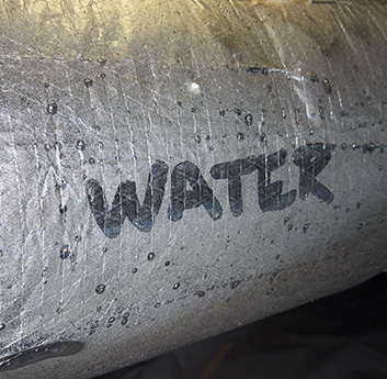 the word water written in condensation